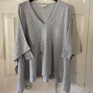 V-neck poncho sweater with sleeves b
